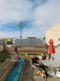 Just Redo It - Photo 4 of 9 - The roof became the perfect location for their vegetable garden, as well as benches and a recreation space crowned by a hot tub powered by a four-kilowatt solar array.