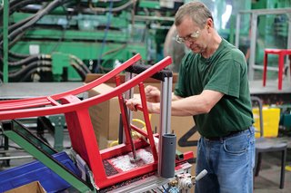 One of the final steps is to install the H-Brace and feet, both fabricated on another mold.