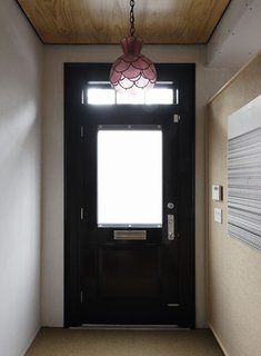 Family Home Renovation in Brooklyn - Photo 13 of 28 - Lange and Dixon opted to use wood for surfaces, such as the ceiling here, where it isn't generally employed.