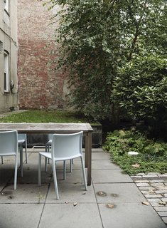 Family Home Renovation in Brooklyn - Photo 20 of 28 - A quartet of Jasper Morrison Air Chairs for Magis provide outdoor seating.