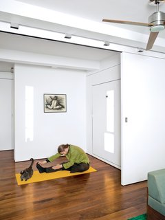 Once you fold up the Murphy bed in the bedroom, there’s plenty of space for a stretch—even for Robert, who’s six-foot-four.