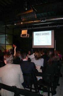 Design Week: Public Eateries - Photo 3 of 9 - At the back of the showroom, a large crowd gathered.