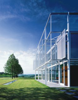The glass and white-painted steel Taghkanic House was Phifer’s first big commission.
