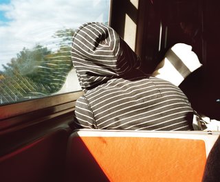 Five Boroughs in 48 Hours - Photo 4 of 32 - A subway rider takes a rest.