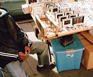 Five Boroughs in 48 Hours - Photo 13 of 32 - A street vendor has watches for sale.