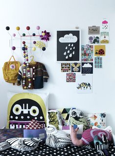 Varpu's bed is piled with a motley assortment of plush cushions: "I love pillows and can’t resist when I see a nice one. Children love them too."<br><br>Don't miss a word of Dwell! Download our FREE app from iTunes, friend us on Facebook, or follow us on Twitter!
