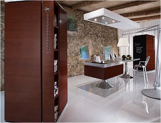 In addition to the island and wall section, the system also features standalone cabinets which can house pots, pans, and dishes as well as appliances.