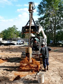 The structure will be built from eleven shipping containers. First, the foundation must be built, and the water and wastewater piping systems installed. Photo ©2011 epic software group, inc.