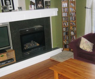 Building the Maxon House: Week 1 - Photo 2 of 10 - Slice of existing living space. Lots of craftsman detailing, pre-built spaces for television, fireplace, etc.