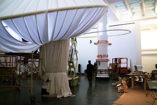 The hall features 16 columns and four interior walls that form a smaller, though not fully enclosed, center room. "We thought, can we transform these columns, and not only make it a decorative aspect?" Lukyanov recalls. "Can they also become functional? Can they become objects that provide lighting?"