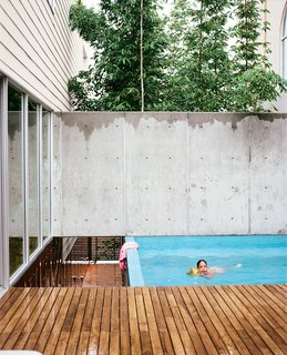 The small pool at the top of the landing provides the family with a place to cool off.