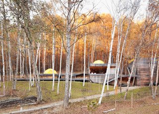 The long, lean Kobayashi complex includes a bathroom and storage room in the structure on the far right.