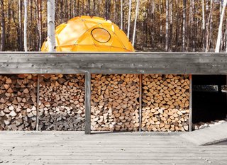A stockpile of wood sheltered from the elements.