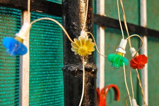 Colors are everywhere, from women's clothing to food. These simple lights hanging on a house really caught my eye.