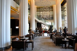 The grand lobby of the Marriott in Pune is in direct contrast to it's surroundings. It's one of many new luxury hotels popping up in the city, which is a growing tech hub.