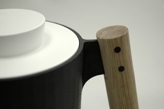 AWAA's Cast Iron Cookware - Photo 1 of 3 - The "dowel handle," the trio writes, "provides an ergonomic powergrip while contributing to the concept of cookware as 'tools.'"