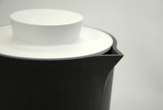 AWAA's Cast Iron Cookware - Photo 2 of 3 - The color and shape of the lids is similar to another product the design team presented at the Salone Satellite, the Mono cup, which features a knob-like handle.