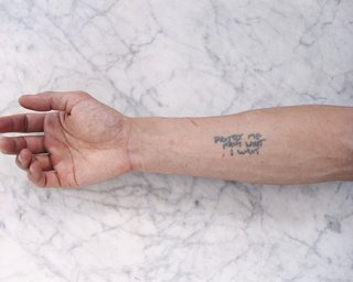 The Wong Show - Photo 7 of 7 - Tobias Wong, Protect Me From What I Want, 2002; artist tattoo; © Estate of Tobias Wong. Photo courtesy SFMOMA.