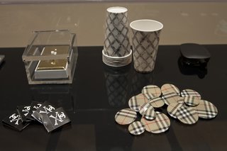 The Wong Show - Photo 3 of 7 - Another selection of objects on display including Unauthorized Burberry Buttons (1999). Burberry took to Wong's shenanigans and used the pins in one of their advertising campaigns. Photo courtesy SFMOMA.