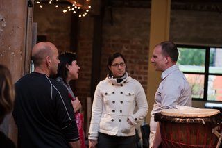 72 Hour Urban Action - Photo 3 of 6 - During pre-discussion drinks, Halbrecht chats with attendees in REBAR's studio space. Photo by Søren Schaumburg.