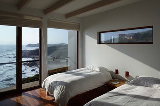 Tunquen Treasure - Photo 8 of 13 - Beyond the guest bedroom lies the rocky shore and the coastline's dramatic landscape. A 20-minute walk takes Schneider and her guests to small ponds (and calmer waters) in which to swim.
