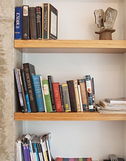 A close-up of the bookshelves made of MDF clad in bamboo veneer.