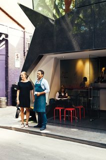 Melbournians take their food and drink as seriously as their design. Cafes, bars, and restaurants that pay as much attention to what’s on the menu as what surrounds it abound. Liaison Cafe has a friendly, well-executed interior tucked away on tiny Ridgeway Place. It’s on the bottom floor of the geometric Monaco House by architects McBride Charles Ryan.