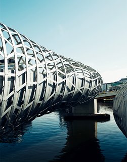 The Webb Bridge in Docklands is a curving footbridge designed by Melbournian superfirm Denton Corker Marshall. It's meant to evoke an aboriginal eel trap.