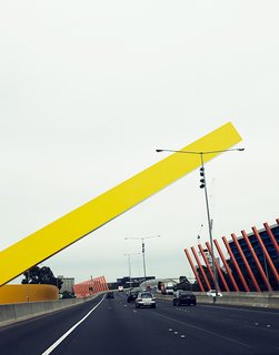 The Citylink Freeway has all manner of massive sculpture and public art along it. This sculpture, which welcomes drivers to Melbourne, is by the architecture firm Denton Corker Marshall and went up in 1999.