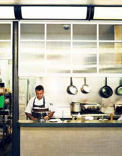 Upstairs from Journal Cafe is Journal Canteen, where the staff makes sure everything is in order. Designer Rabindra Naidroo took inspiration from 1930s Italian mess halls.