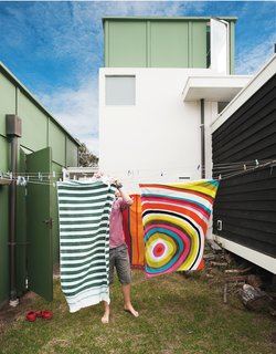 Bach to the Beach - Photo 5 of 30 - Gerald wanted the siting of the buildings to appear loose, like a campsite. The gap between the living room and the bedroom wing accommodates a washing line.