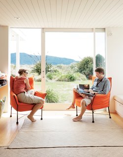 Bach to the Beach - Photo 12 of 30 - Kate and Gerald relax in the living room.
