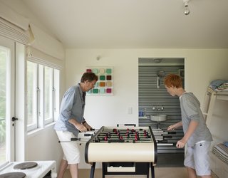 Bach to the Beach - Photo 21 of 30 - Will and Tom enjoy their other bedroom essential: a foosball table.