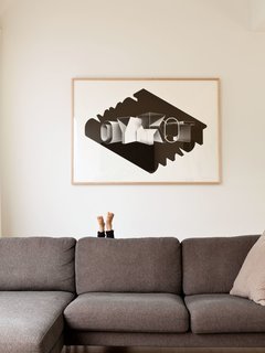 Little feet pop up behind the Neo Sectional Chaise Left by Niels Bendtsen from DWR. The print, which reads Tokyo in reverse, was done by David's friend Eric Cruz.