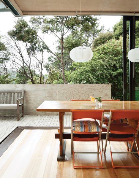 Make Your Parents Happy by Building Them a House - Photo 9 of 25 - The home’s sliding doors blur the boundaries between inside and out.