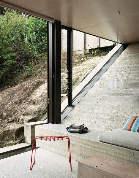 Make Your Parents Happy by Building Them a House - Photo 4 of 25 - Builder Ross Percival helped finesse the finely tuned detailing that separates the internal slope from the rock outside (opposite). The Pedro wire stool is by Craig Bond for Candywhistle.