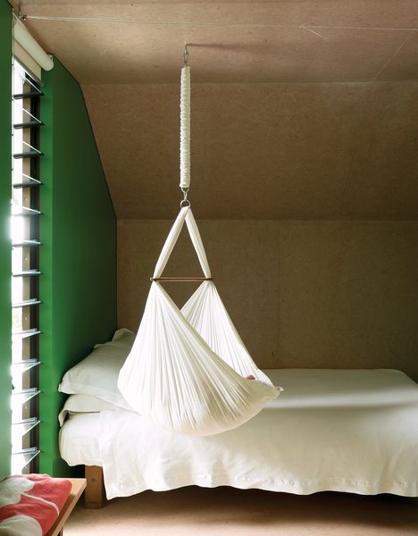 Make Your Parents Happy by Building Them a House - Photo 5 of 25 - For now, one-year-old Awa is small enough to sleep in the hammock that hangs from the ceiling.