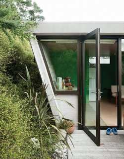 Amanda designed the upstairs studio with its own entrance and a small kitchen and bathroom for when she, Adam, and Awa come to visit.