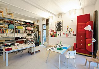 Jongerius’s studio is a vibrant jumble of prototypes, products, and samples, including a red Polder sofa for Vitra and, on the far right, a Blossom lamp for Belux and prototype for the Rotterdam Chair for Vitra.