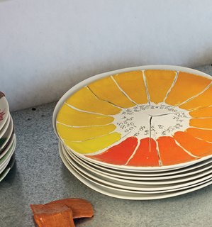 Evidence of color experiments populate Jongerius's studio, including this one, a study of yellows and oranges on ceramic.