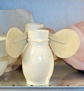 A ceramic-and-leather Mouse vase from her Home Props series.
