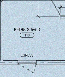 The entrance to each of the boys' rooms is through a barn-style sliding door. Each room has a floor-to-ceiling operable window.