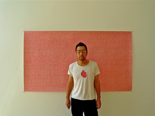 Sasaki stands before a drawing of his own heartbeat at his studio in downtown Los Angeles.