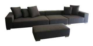 New Products Debuting at DOD - Photo 3 of 6 - Rest your feet with a sit on Hold It Contemporary Home's new Lola Sectional sofa.