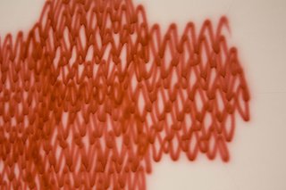 From the Show Floor: Sasaki - Photo 2 of 4 - A detail shot of the painted canvas.