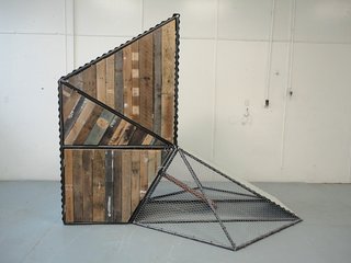 If You Build It, They Will Cluck - Photo 3 of 3 - Students cut corrugated metal and pulled pallets apart to create Chicken Circus, which opens above and below to fill feed and collect eggs.