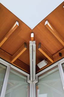 Family Matters - Photo 8 of 16 - The visible structural engineering is part of the beauty of the home’s design. At the roof corner, a double-channel steel hip beam and cantilevered wood rafters come together like pieces of a puzzle.