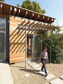 Family Matters - Photo 13 of 16 - The master bedroom has sliding doors that connect directly to the backyard.