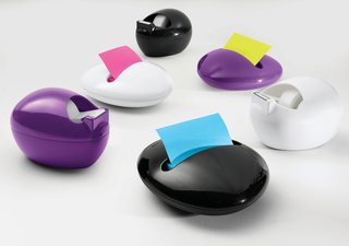 The full range of 3M's Pebble Collection by Karim: the Post-It Dispenser and Scotch Dispenser each in white, black, and purple.