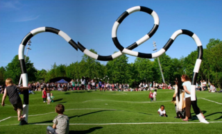 Playgrounds Worth A Trip - Photo 5 of 8 - "Puckelball" is a variant of soccer played on a field that looks like it was attacked by giant moles with a goal designed by the Mad Hatter. Its creator, artist Johan Strom, thinks of it as a metaphor for life: <br><br>"Many live under the belief that life is a fair playing field, that both pitch halves are just as big and the goal always has at least one cross. But ultimately the ball never bounces exactly where you want it to and the pitch is both bumpy and uneven." The world's only Puckelball pitch is in Malmö, Sweden, a city with many other great playgrounds and public spaces as well. Definitely worth a trip!